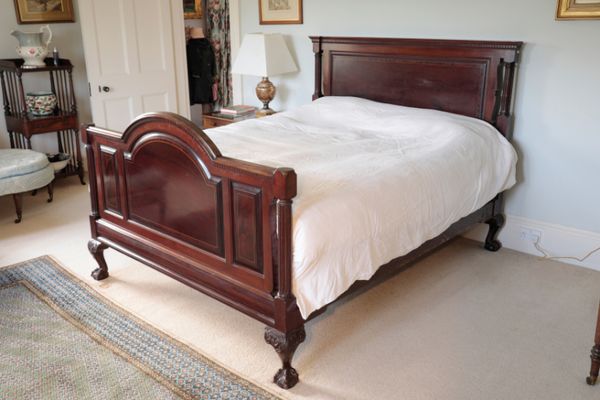 A VICTORIAN MAHOGANY DOUBLE BED, IN NEOCLASSICAL STYLE,