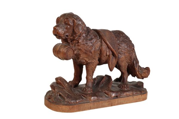 A 'BLACK FOREST' CARVED LINDEN WOOD MODEL OF A SAINT BERNARD DOG,