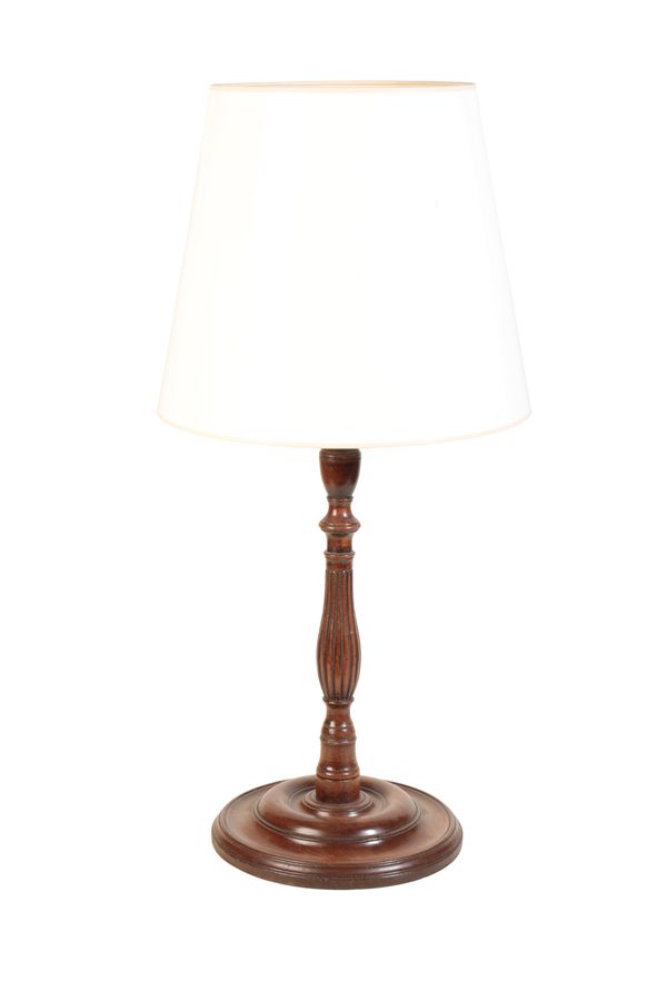 A TURNED AND STAINED MAHOGANY TABLE LAMP, IN THE FORM OF A GEORGE III CANDLESTICK,