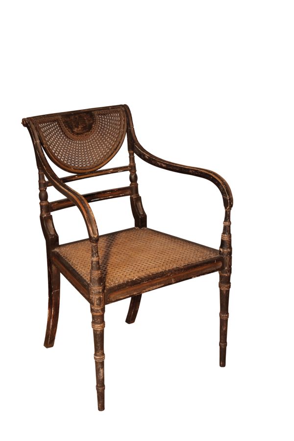 A LATE GEORGE III PAINTED WOOD AND CANEWORK ELBOW CHAIR,