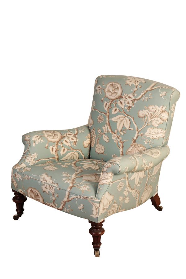 A VICTORIAN UPHOLSTERED ARMCHAIR, IN THE MANNER OF HOWARD & SONS,