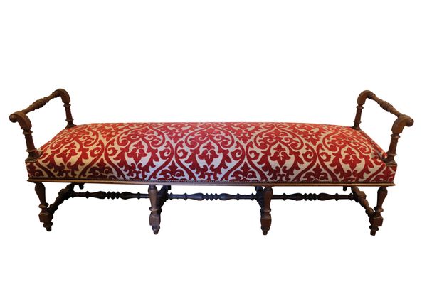 A VICTORIAN OAK AND UPHOLSTERED WINDOW SEAT,