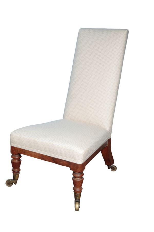 A ROSEWOOD AND UPHOLSTERED LOW NURSING CHAIR, PROBABLY BY GILLOWS,