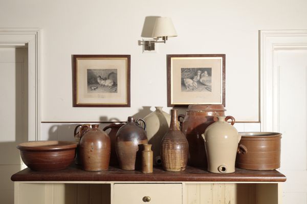 A COLLECTION OF DOMESTIC GLAZED STONEWARE VESSELS,