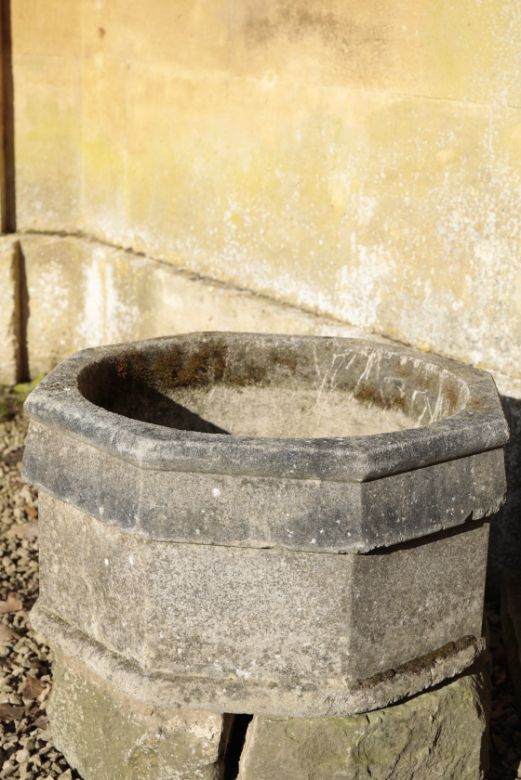 A PAIR OF STONE COMPOSITION GARDEN PLANTERS,