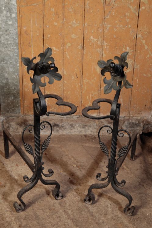 A PAIR OF PAINTED WROUGHT IRON ANDIRONS, IN ART NOUVEAU STYLE,