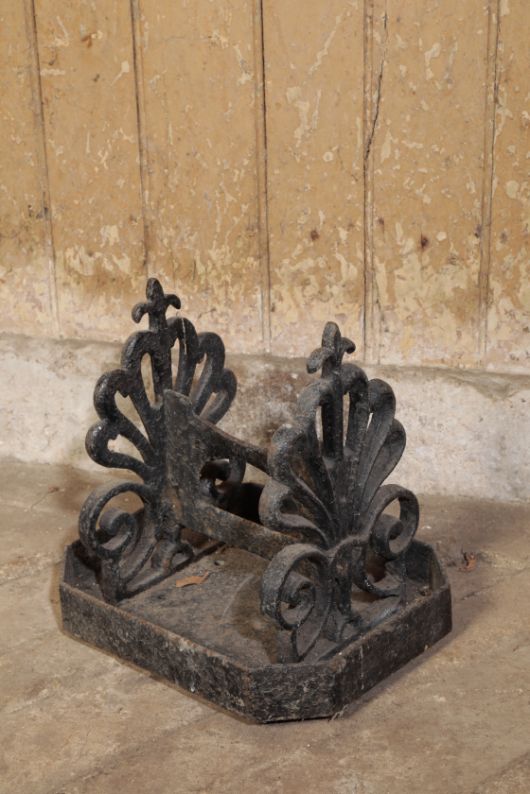 A REGENCY CAST IRON BOOT SCRAPE,