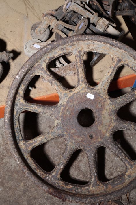 A QUANTITY OF IRON-MOUNTED CASTOR WHEELS,