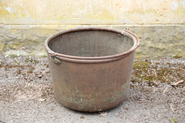 A VICTORIAN COPPER AND IRON-MOUNTED BASIN,