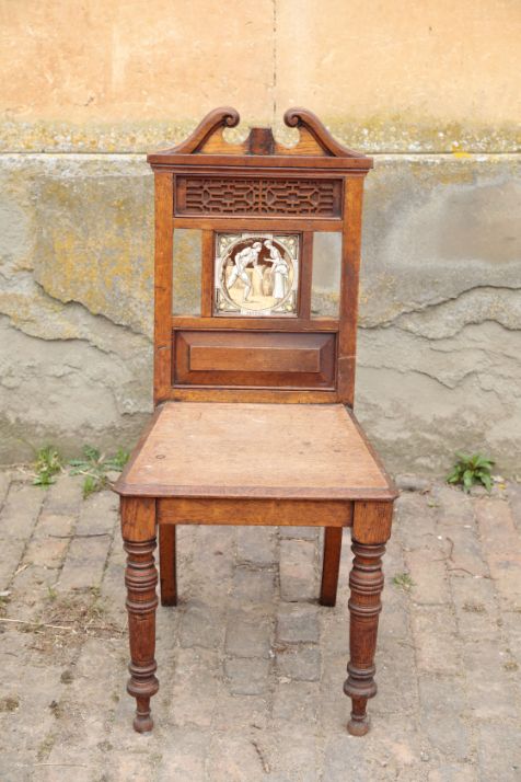 A VICTORIAN OAK HALL CHAIR, IN AESTHETIC STYLE,