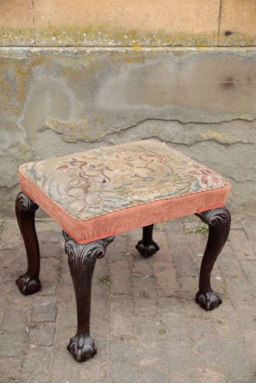 A CARVED MAHOGANY AND BERLIN WOOLWORK UPHOLSTERED STOOL, IN GEORGE III STYLE,