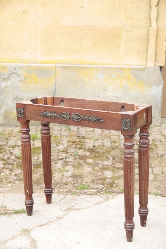 A LOUIS PHILIPPE MAHOGANY AND METAL MOUNTED CONSOLE TABLE,