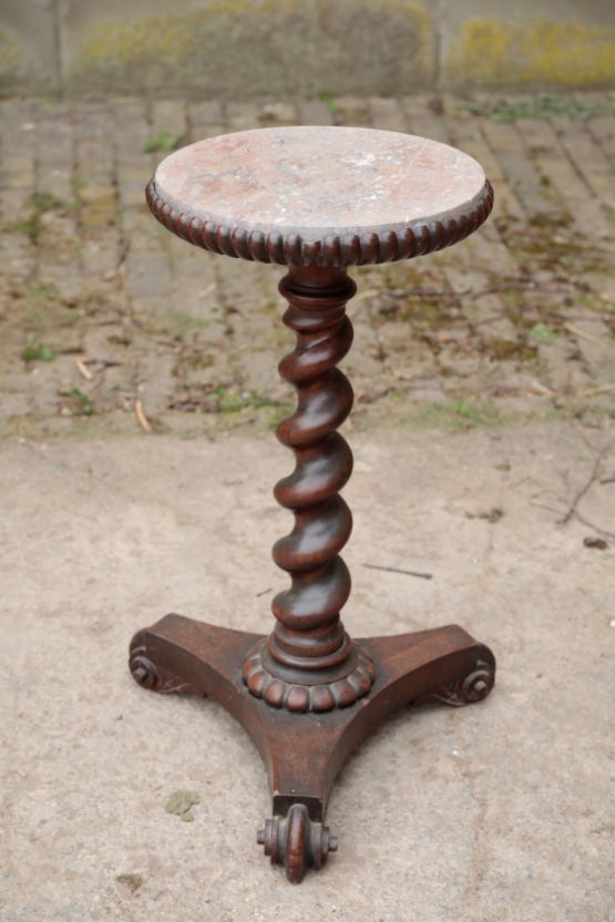 A ROSEWOOD AND MAHOGANY GUERIDON STAND,