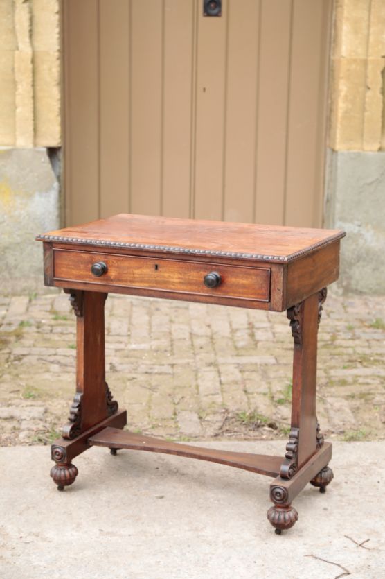 A REGENCY MAHOGANY SIDE TABLE, IN THE MANNER OF GILLOWS,