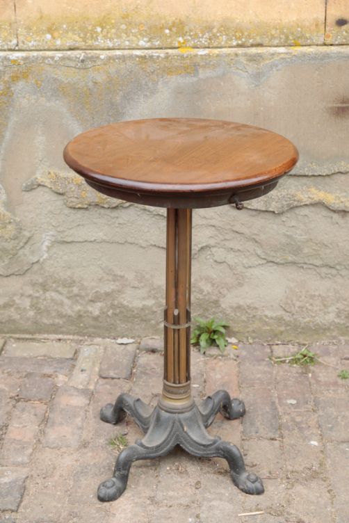 A CONTINENTAL MAHOGONY, CAST IRON AND BRASS MOUNTED CIRCULAR OCCASIONAL TABLE,