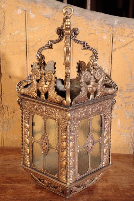 A CAST AND REPOUSSE BRASS HALL LANTERN,