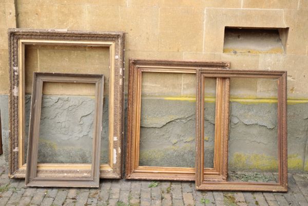 FOUR VARIOUS GILTWOOD AND COMPOSITION PICTURE FRAMES,