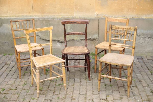 TWO SIMILAR REGENCY PAINTED WOOD AND RUSH SEATED SIDE CHAIRS,