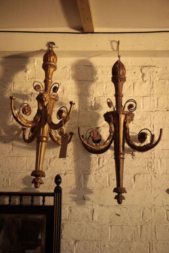 A PAIR OF CARVED, PAINTED, GILTWOOD AND COMPOSITION FOUR LIGHT CHANDELIERS,