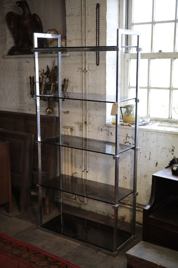 A SET OF CHROMIUM PLATED AND SMOKED GLASS OPEN SHELVES,