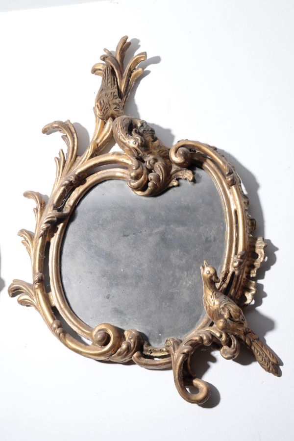 AN EARLY VICTORIAN GILTWOOD FRAMED WALL MIRROR IN ROCOCO REVIVAL STYLE,