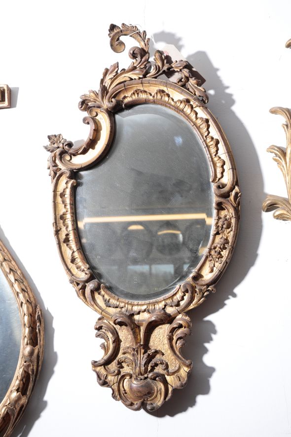 AN EARLY VICTORIAN GILTWOOD AND COMPOSITION FRAMED WALL MIRROR IN ROCOCO REVIVAL STYLE,