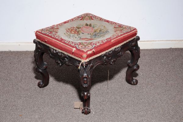 AN IRISH VICTORIAN CARVED MAHOGANY AND BERLIN WOOLWORK UPHOLSTERED STOOL, BY ROBERT STRAHAN,