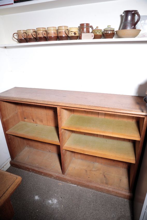 AN OAK OPEN BOOKCASE,