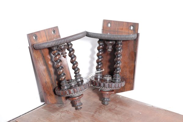 A PAIR OF ROSEWOOD AND OLIVEWOOD HOLZAPFFEL LATHE TURNED WALL BRACKETS,