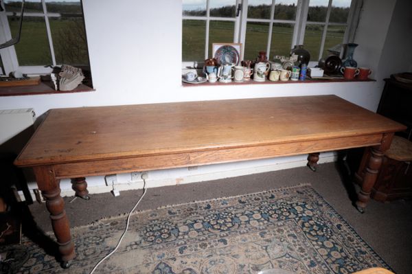 A VICTORIAN OAK REFECTORY TABLE,