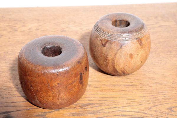 TWO SIMILAR LIGNUM VITAE HORSE TETHERING WEIGHTS,