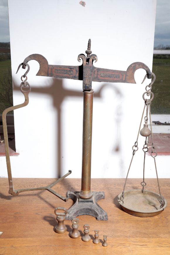 A SET OF BRASS, CAST AND WROUGHT IRON WEIGHING SCALES,