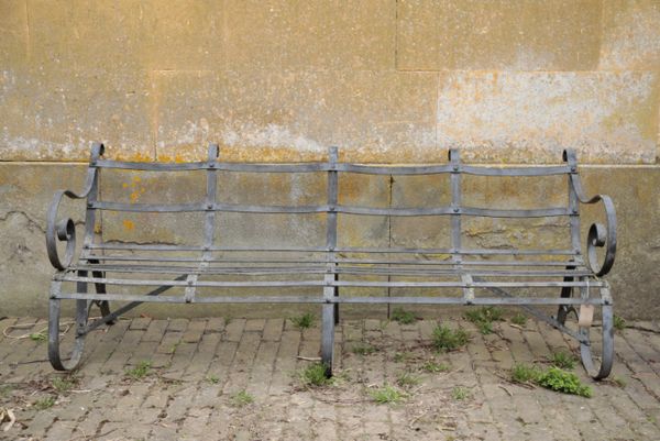 A WROUGHT IRON GARDEN BENCH,