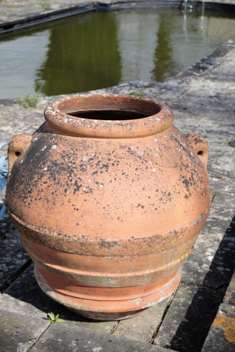 A PAIR OF LARGE ITALIAN TERRACOTTA URNS,