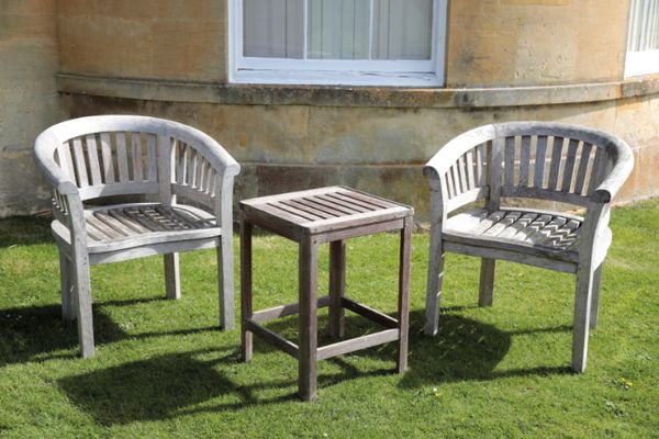 A PAIR OF TEAK GARDEN ELBOW CHAIRS,