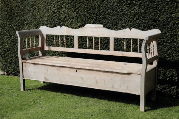 A CONTINENTAL PINE COFFER BENCH,