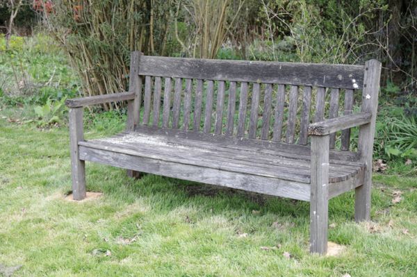 A TEAK GARDEN BENCH,