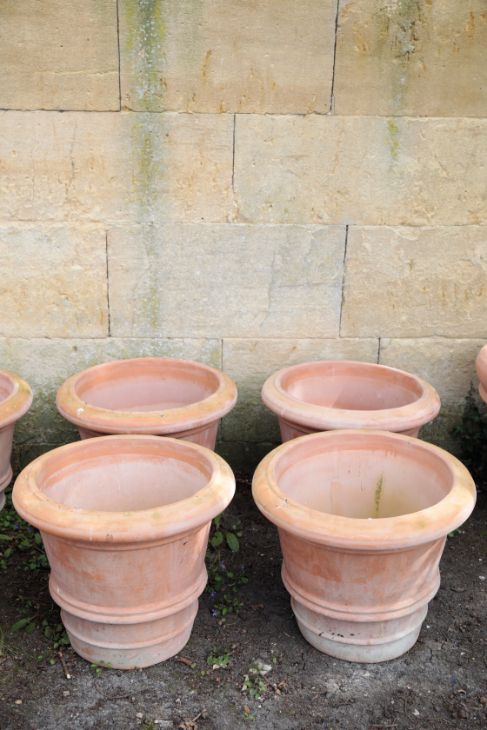 A SET OF FOUR ITALIAN TERRACOTTA GARDEN URNS,