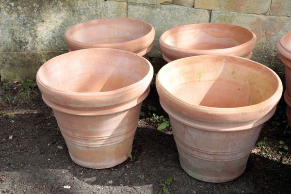 A SET OF FOUR ITALIAN TERRACOTTA GARDEN URNS,