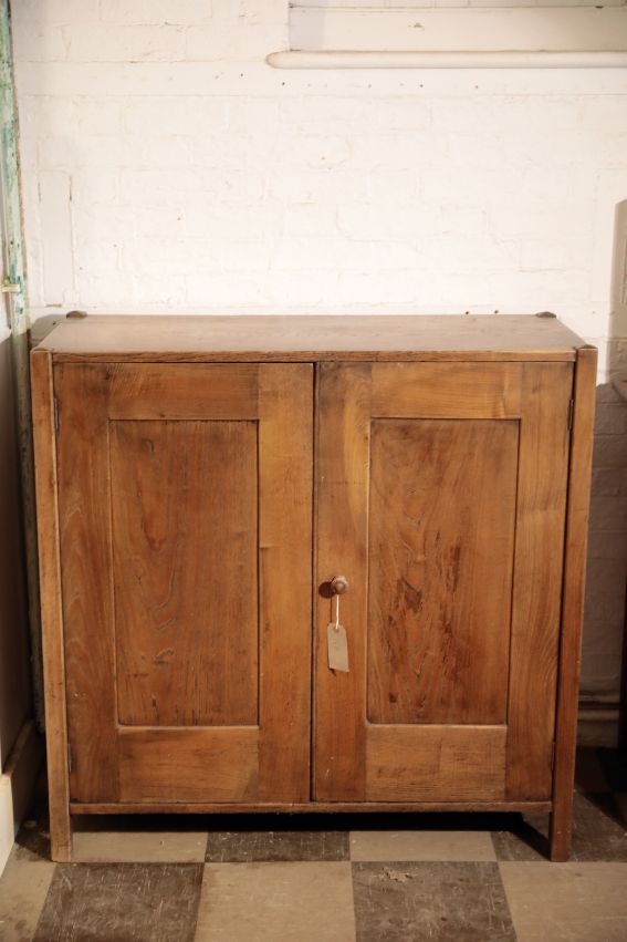 AN OAK 'TOY CUPBOARD', BY HEAL & SON,