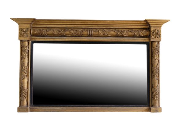 A REGENCY GILTWOOD AND COMPOSITION FRAMED OVERMANTEL MIRROR,