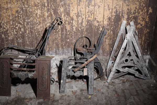 FOUR PAIRS OF IRON GARDEN BENCH ENDS,