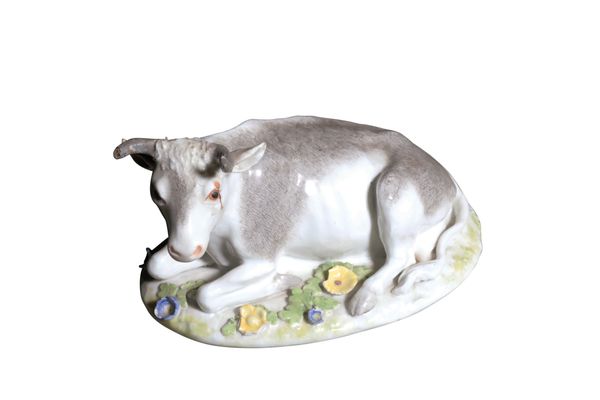 A MESSIEN FIGURE OF A RECUMBANT COW