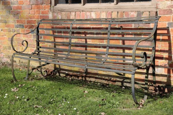 A VICTORIAN WROUGHT IRON GARDEN BENCH,