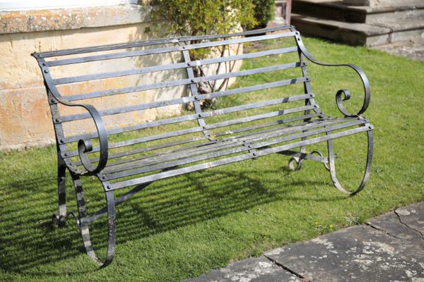 A VICTORIAN WROUGHT IRON GARDEN BENCH,