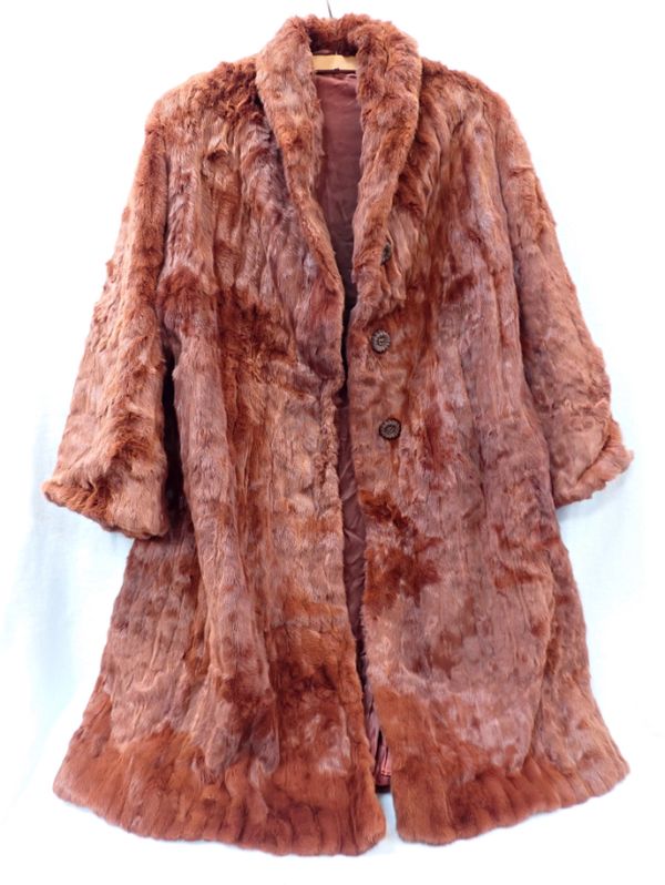 A LADIES' FUR COAT