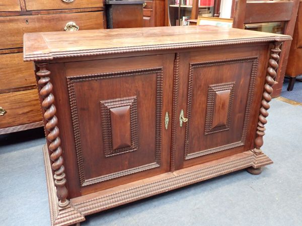 AN EARLY 19TH CENTURY DUTCH ROSEWOOD TWO DOOR CABINET