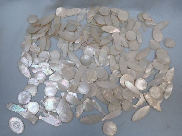 A LARGE COLLECTION OF 19TH CENTURY MOTHER OF PEARL COUNTERS