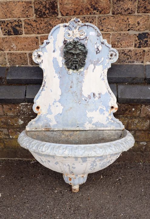 A PALE BLUE ENAMELLED CAST IRON FOUNTAIN