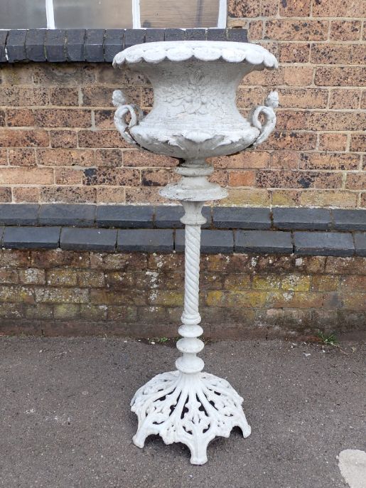 A VICTORIAN CAST IRON JARDINIERE